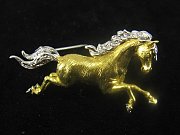 Diamantbrosche -Pferd im Galopp-