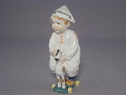 Meissen Figur Hentschelkind mit Zeitungsmtze